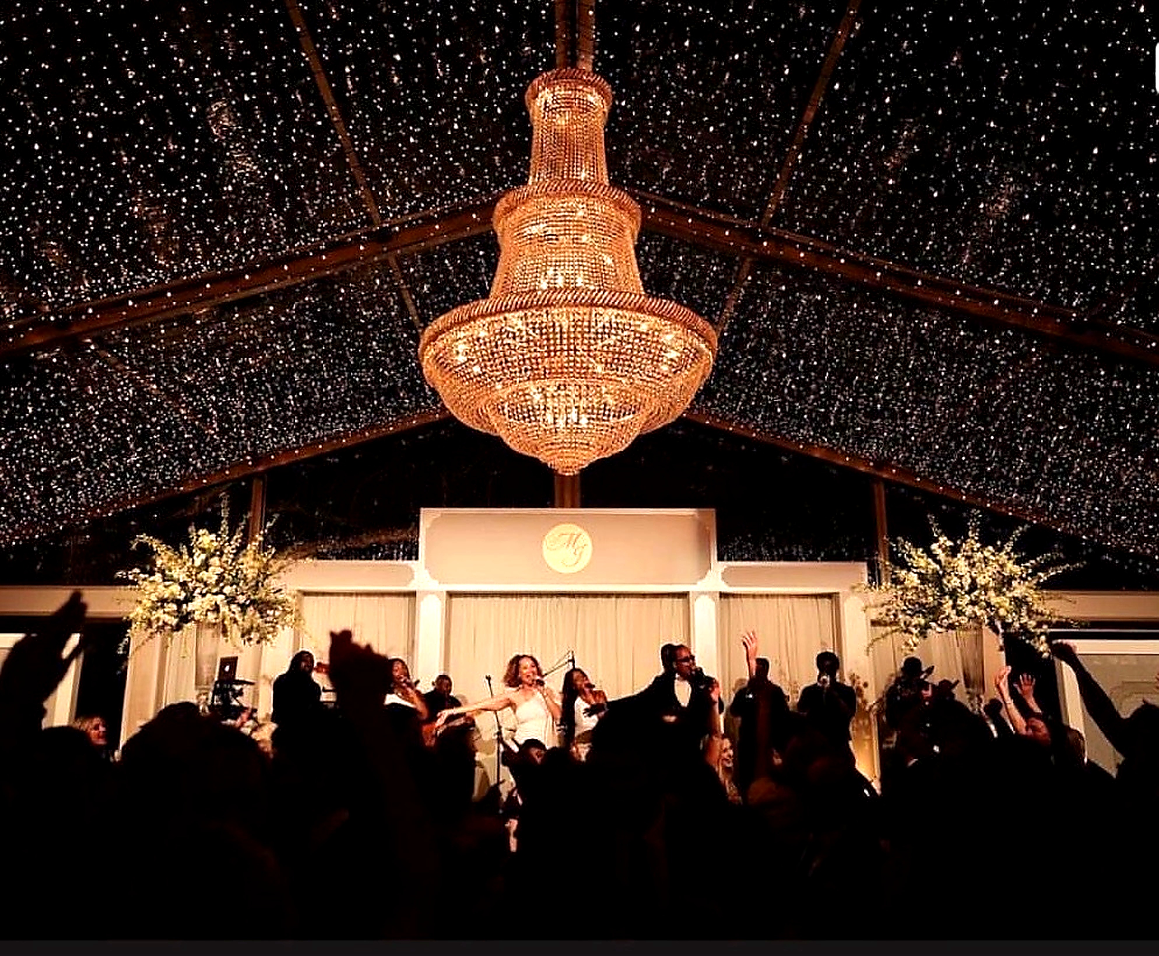 Bright Event Productions — Live event under a grand chandelier